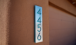 modern house numbers plaque in brushed aluminum turquoise
